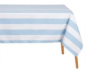 Light blue and white wide cabana striped cotton linen tablecloth with straight edges draped over a dining table.
