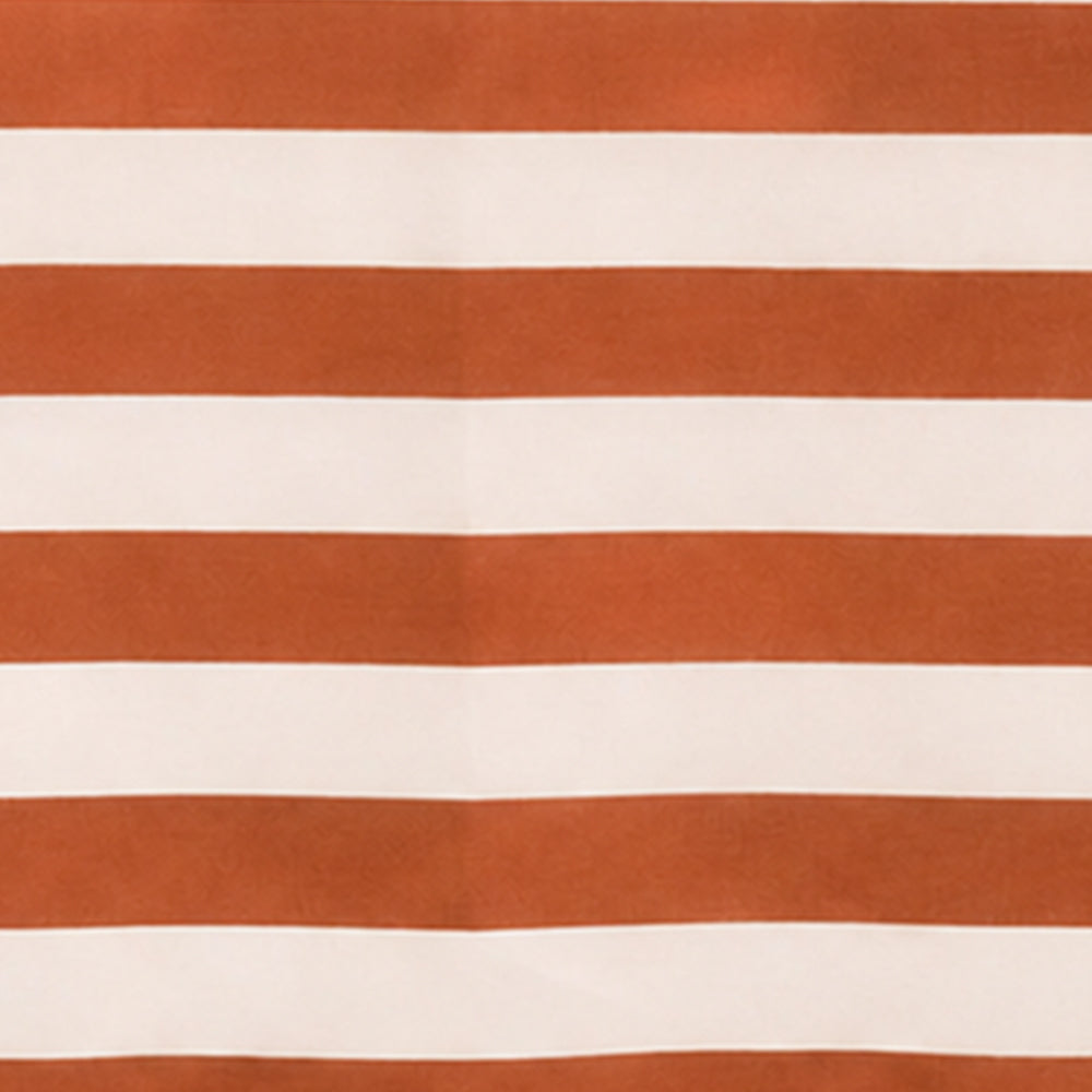 Terracotta striped cotton linen tablecloth with soft woven texture, creating a cozy and elegant dining room setting.