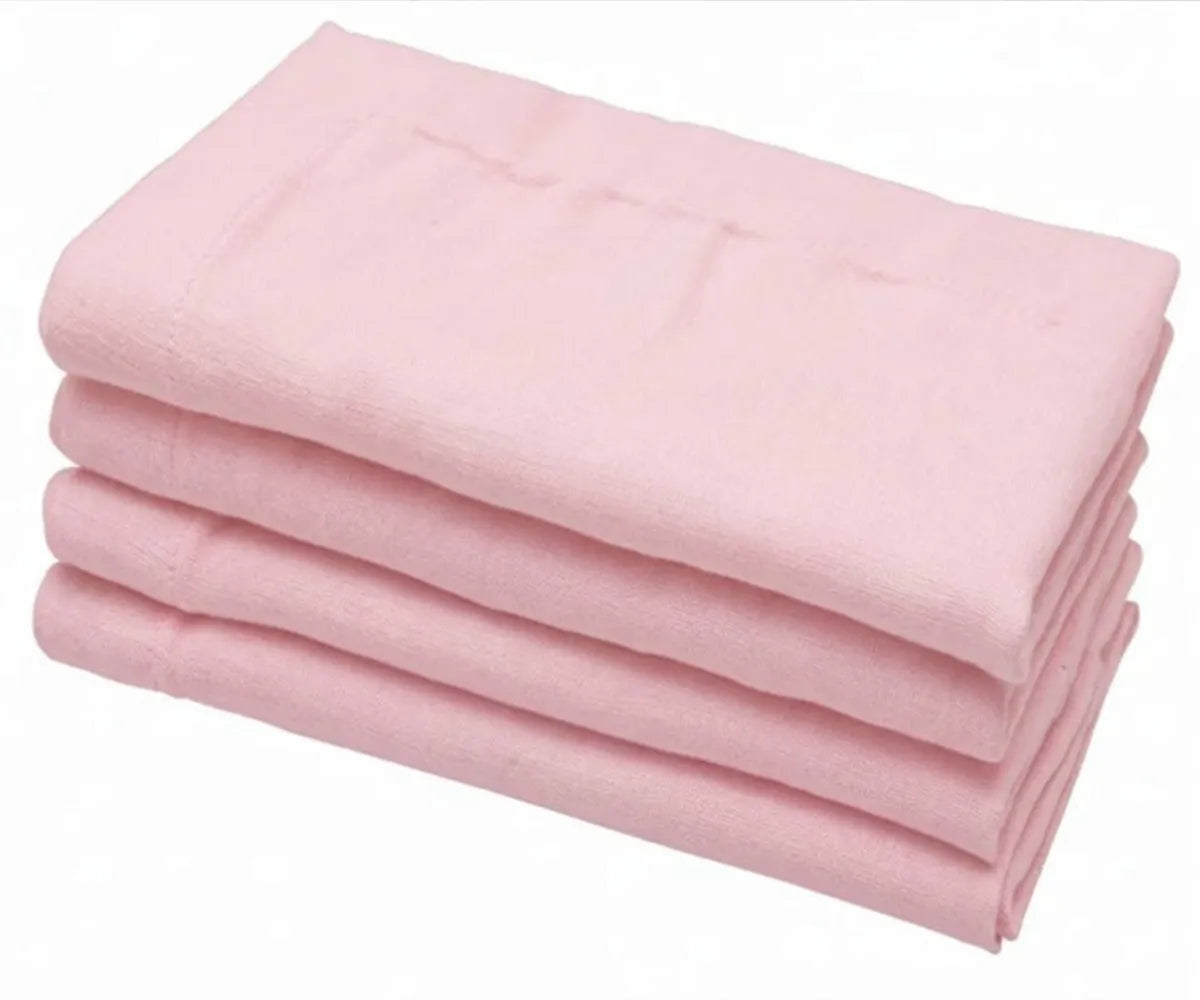 Assorted color cotton linen napkins paired with table linens for elegant event décor