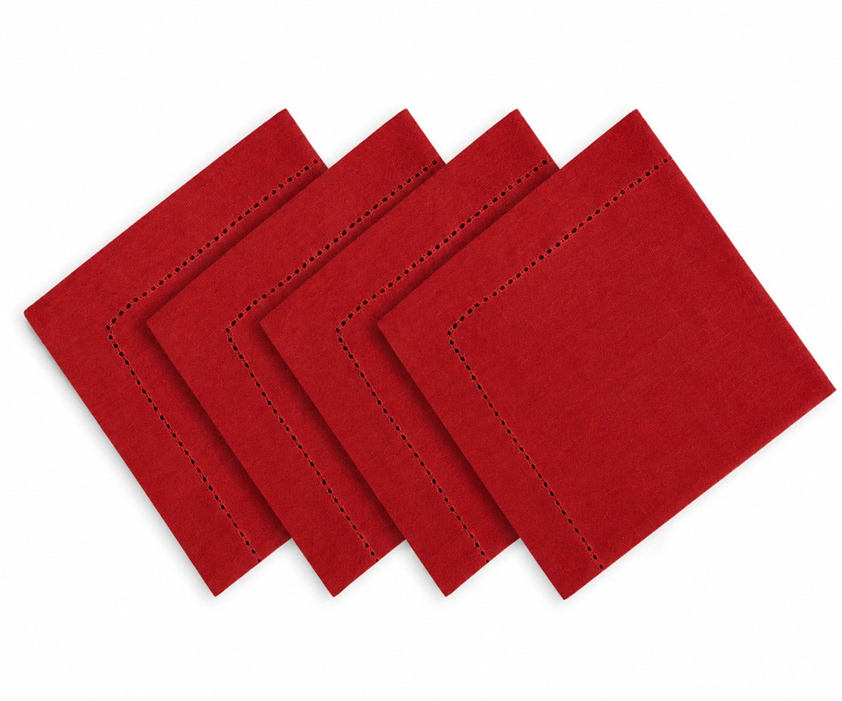Four red square fabric napkins with black stitched borders, arranged in a staggered overlapping layout on a white background.