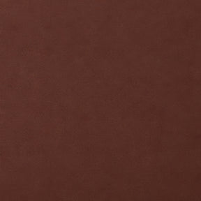A close-up of a solid dark brown textured material, resembling leather or suede.