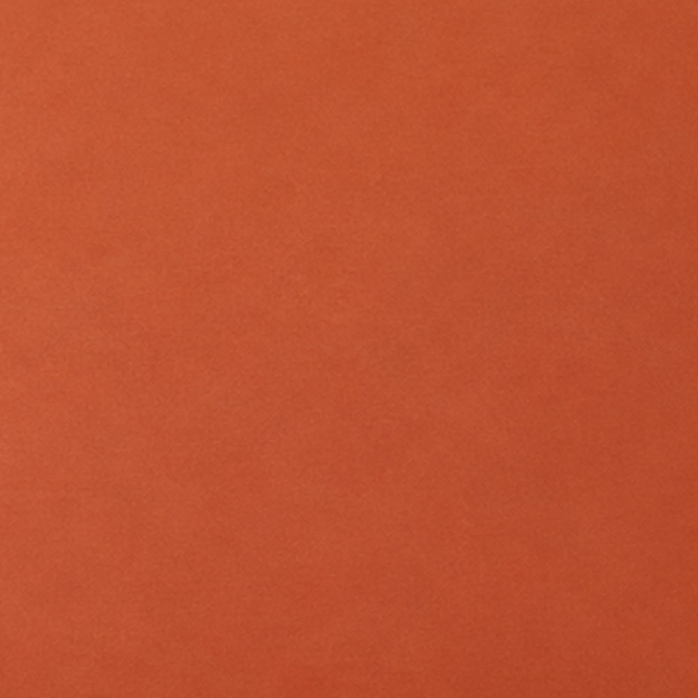 A solid, warm terracotta textured surface filling the entire frame.