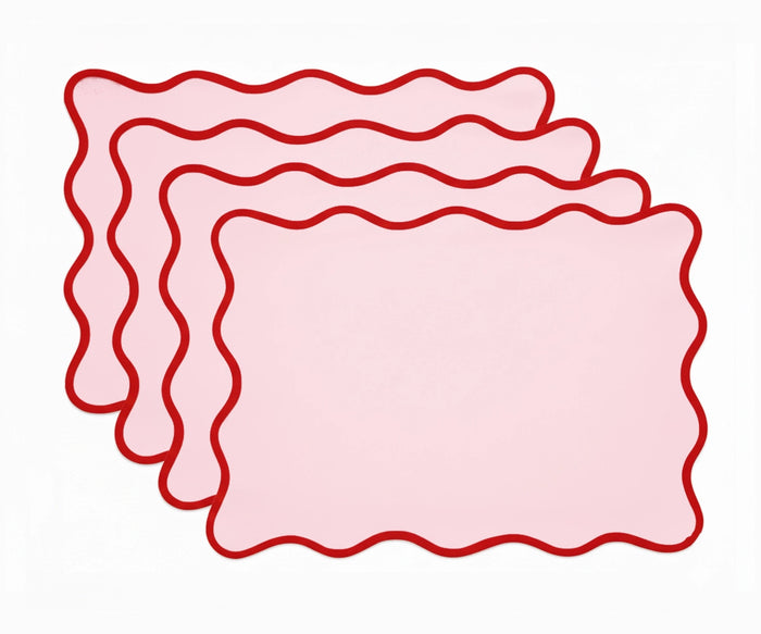 Red cotton placemat with scalloped edge