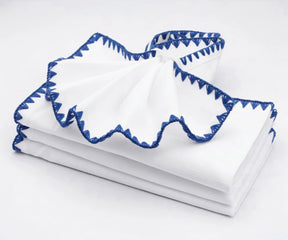 White and blue embroidered dinner napkins – soft cotton reusable napkins for kitchen and dining tables.