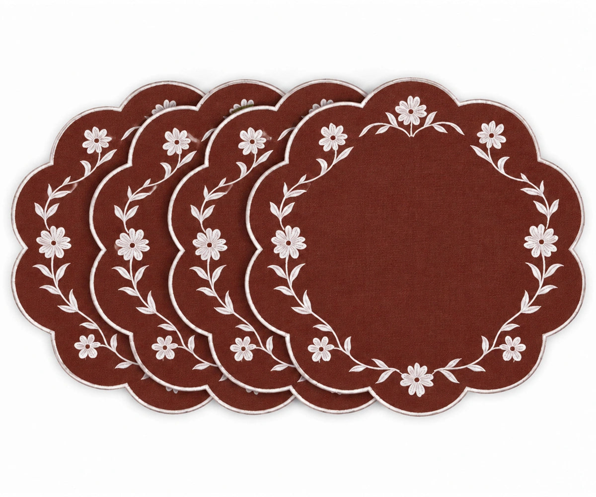 brown floral scalloped edge placemats with white embroidered flower and vine design