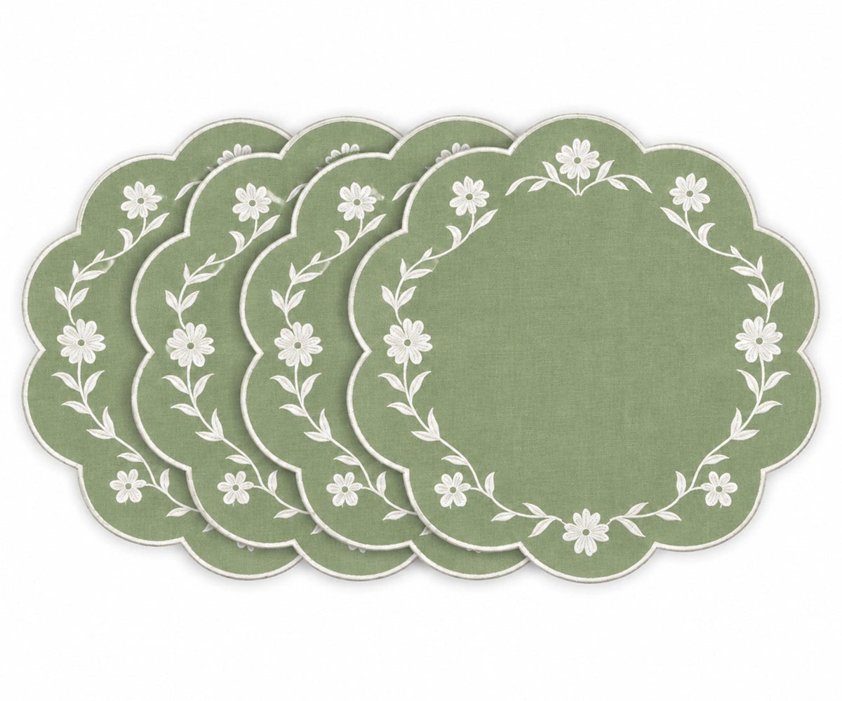 sage green scalloped placemats with white floral embroidered border design