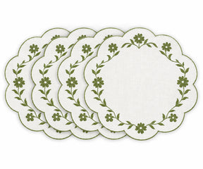 white scalloped placemats with white floral embroidered border design
