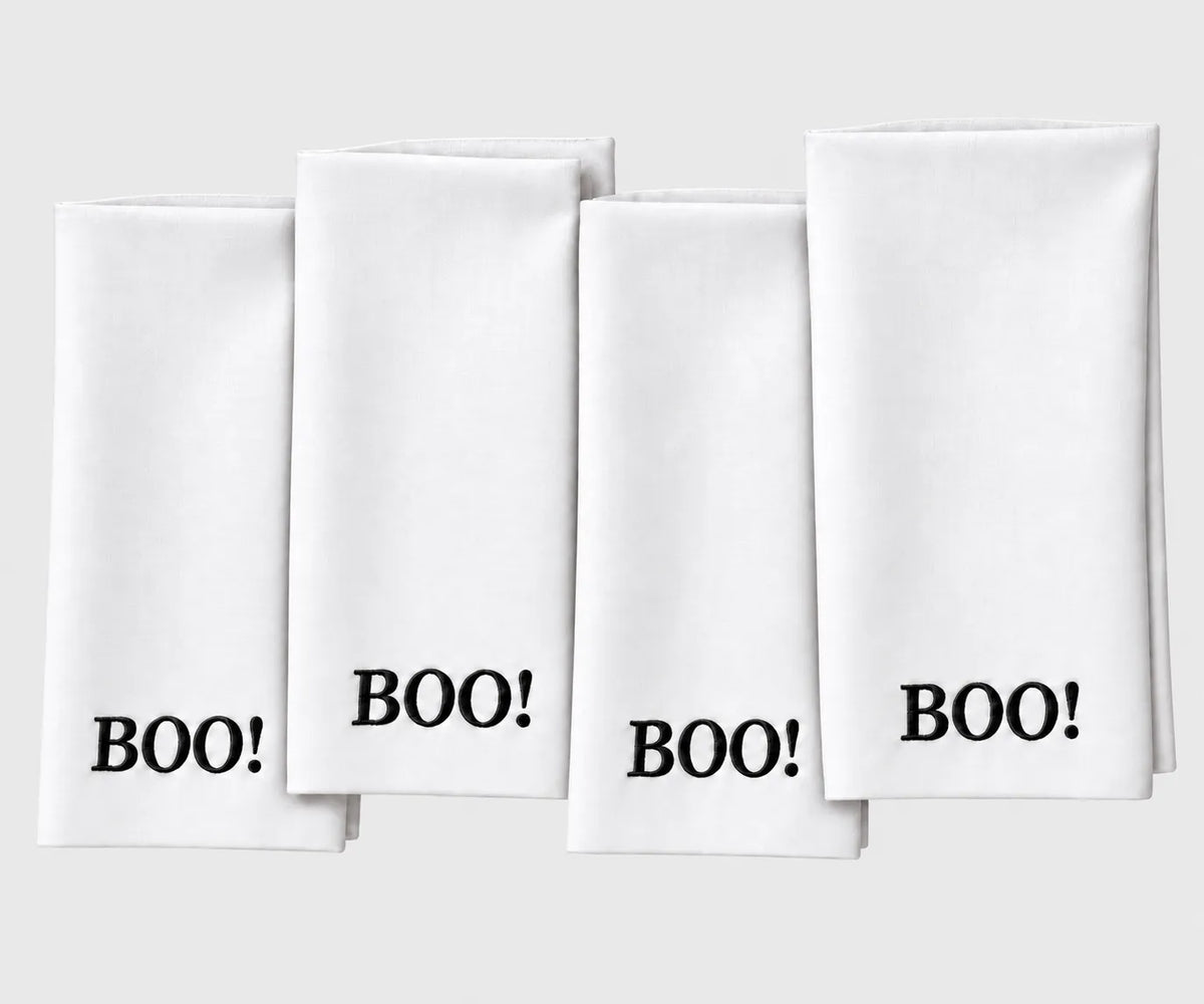 White and black Halloween cloth napkin for festive table settings Decorative reusable dinner napkin for Halloween parties, spooky dinners, fall gatherings, and seasonal table decor.