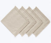 Shop natural cotton napkins with woven fabric and fringe trim. Ideal for farmhouse dining, holiday tables, dinner parties, and elegant place settings.