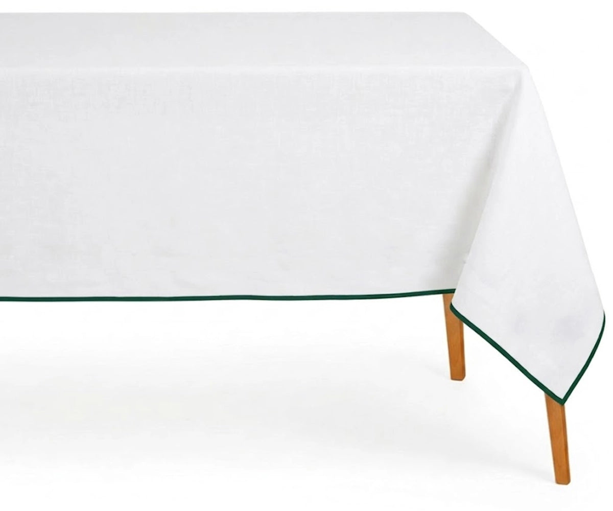 White cotton tablecloth with green piping trim for a Dinner 