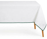 White cotton tablecloth with green piping trim for a Dinner 