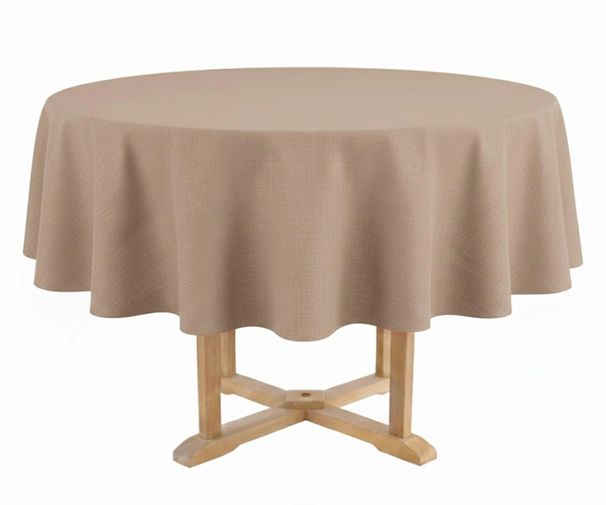 Round table with a dark beige tablecloth on a white background
