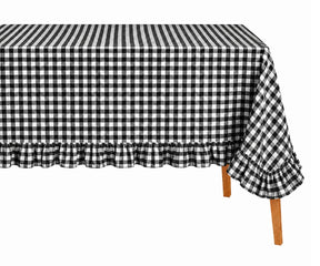 Farmhouse style cotton tablecloth with ruffle edges and gingham checks

