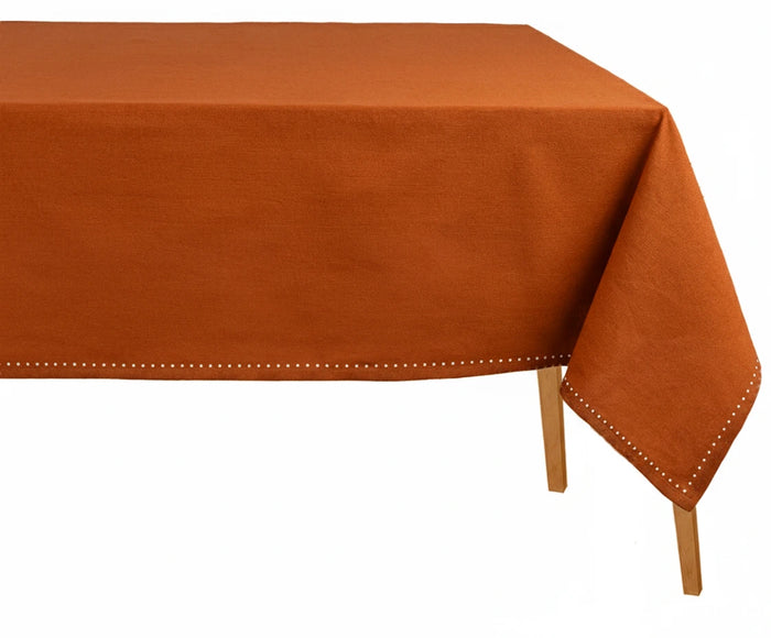 Rust hemstitch cotton tablecloth for rectangular dining tables, elegant 100% cotton fabric perfect for weddings, holidays, and everyday décor.