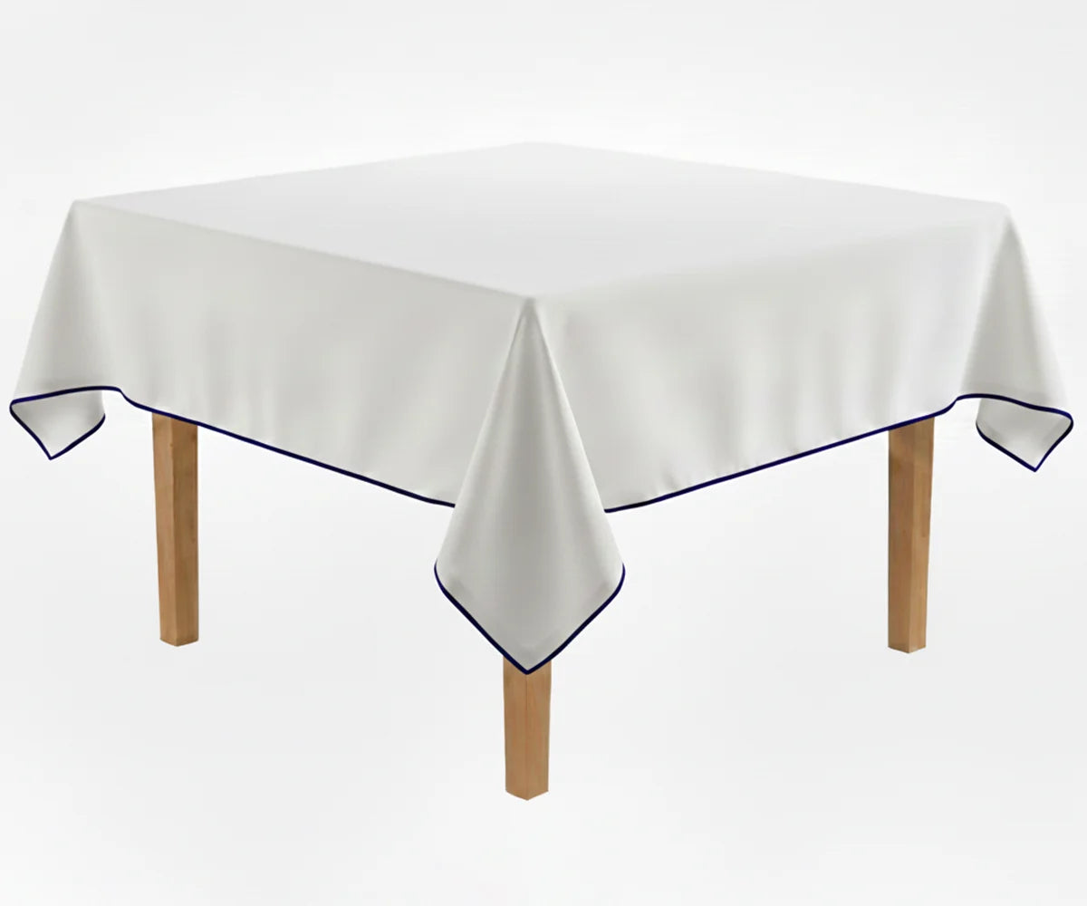 White dining tablecloth with Navy blue piping trim