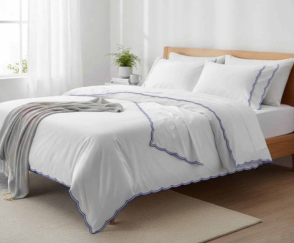 Navy blue scalloped edge bed sheet set in 100% cotton with fitted sheet, flat sheet and pillowcases