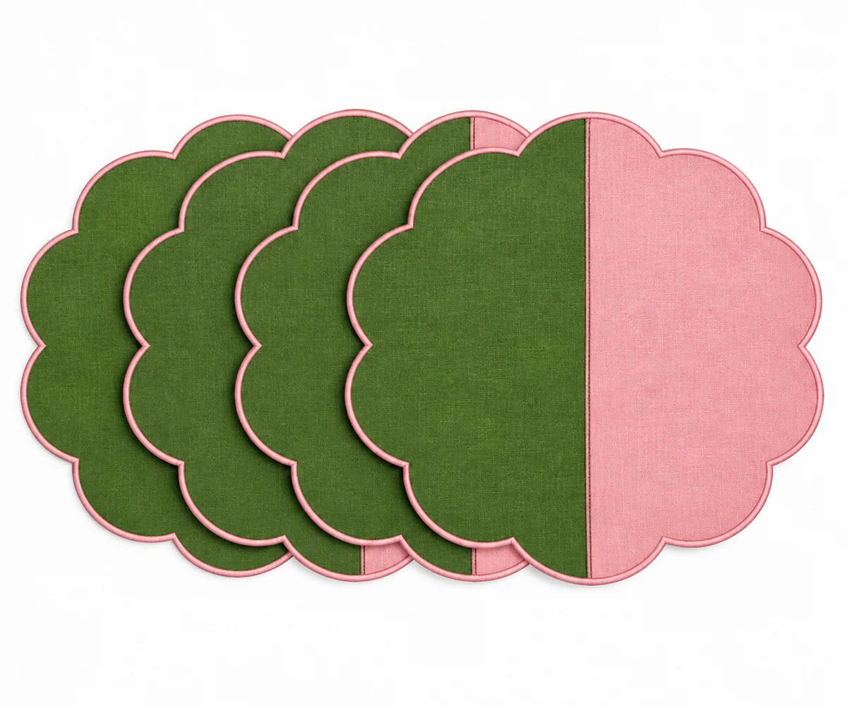 Cotton scalloped round placemat set in green and pink.