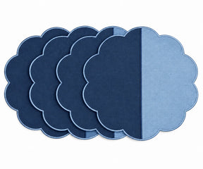 Cotton scalloped round placemat set in light blue and navy.   