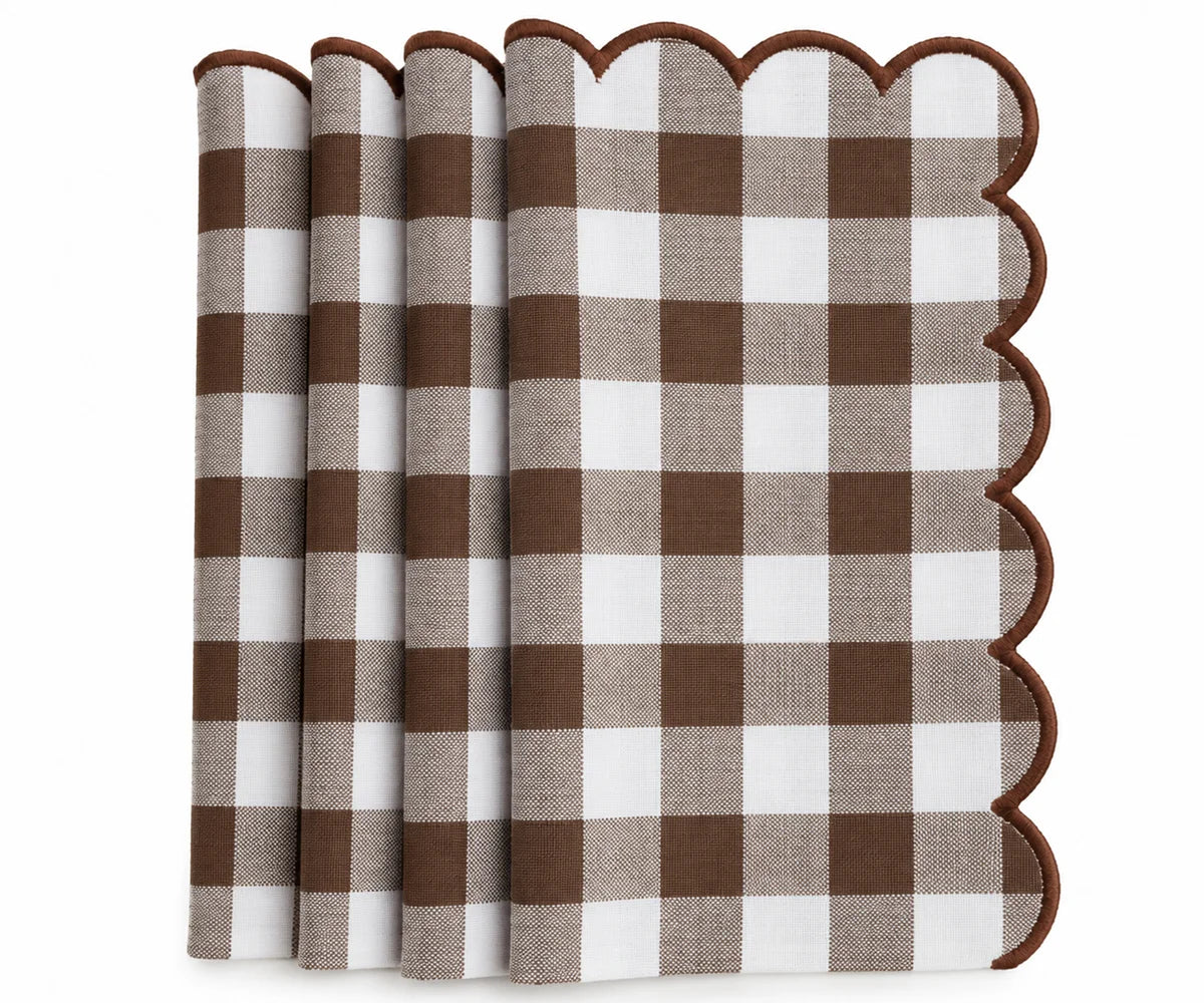Set of brown and white gingham cotton dinner napkins with red scalloped embroidered edges