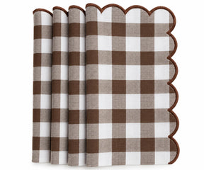 Set of brown and white gingham cotton dinner napkins with red scalloped embroidered edges