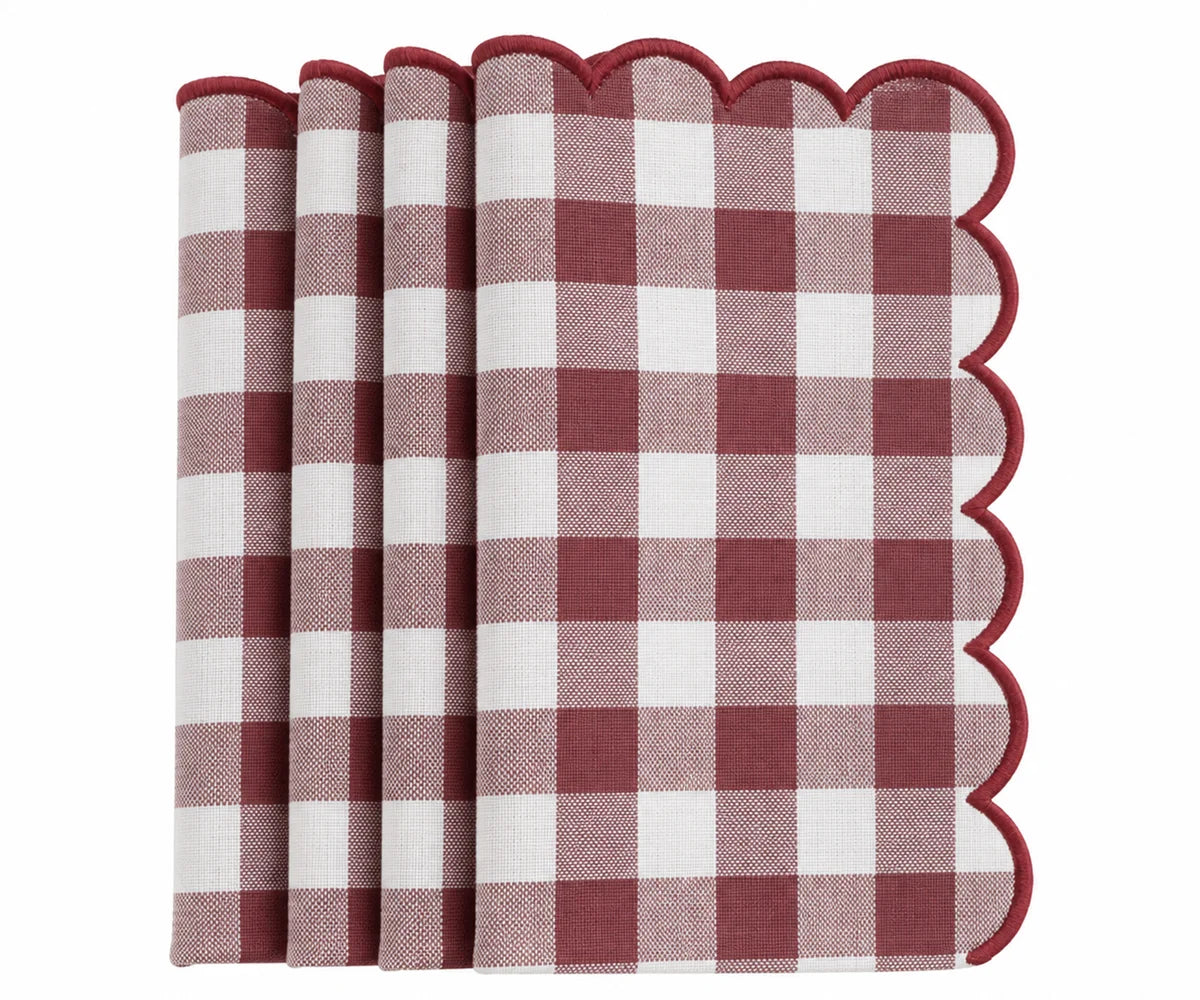 Set of dark red and white gingham cotton dinner napkins with red scalloped embroidered edges