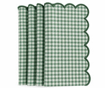 Set of green and white gingham cotton dinner napkins with scalloped embroidered edges.