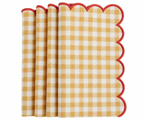 Set of yellow and white gingham cotton dinner napkins with red scalloped embroidered edges
