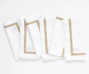 100% cotton dinner napkins with a bordered design, reusable white cloth napkins for everyday dining, weddings, holiday tables, restaurants, and farmhouse table décor.