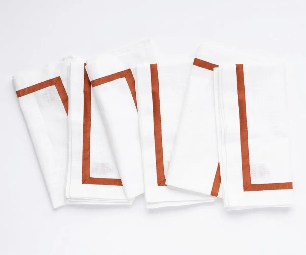 Soft cotton cloth napkins with a decorative border, perfect for dinner parties, holiday tables, restaurants, and everyday use.