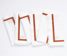 Soft cotton cloth napkins with a decorative border, perfect for dinner parties, holiday tables, restaurants, and everyday use.