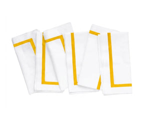 White table napkins made from 100% cotton with a border detail, reusable fabric napkins for elegant dining and entertaining.