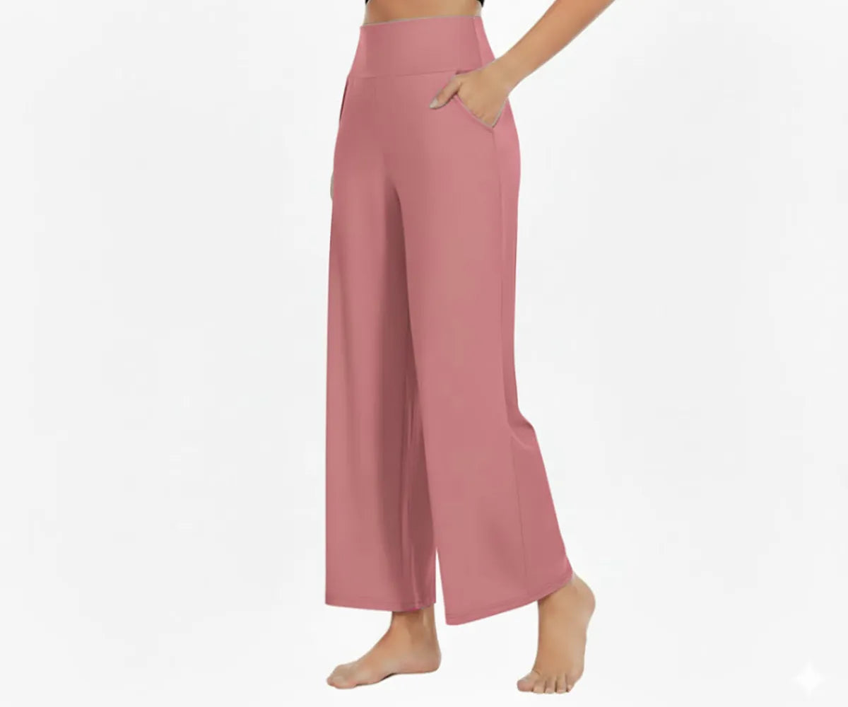 Pink women’s cotton lounge pants – lightweight relaxed pants ideal for home lounging, travel, or casual styling.