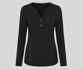 Women’s black V-neck long sleeve organic cotton t-shirt styled for everyday comfort and a sleek minimalist look.