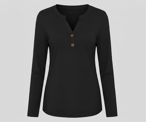Women’s black V-neck long sleeve organic cotton t-shirt styled for everyday comfort and a sleek minimalist look.