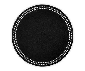 Set of 4 black embroidered cotton placemats arranged for a formal dinner setup