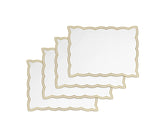 Beige cotton placemats with subtle embroidery on a rustic dining setup