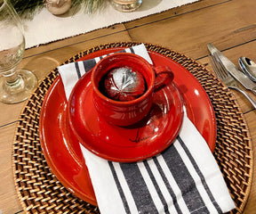Stylish striped dinner napkins made from durable cotton fabric, folded elegantly for a modern dining presentation