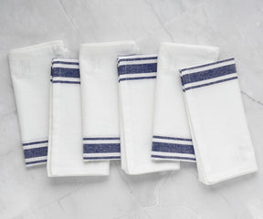 blue cloth napkins, crafted with precision hemstitching for a refined look.