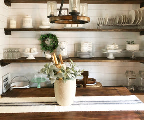 Classic farmhouse style with a charming table runner.