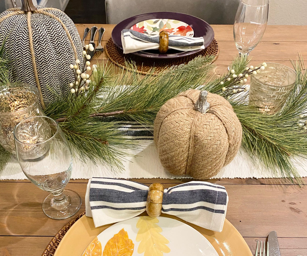 Striped farmhouse table runner for indoor and outdoor dining.