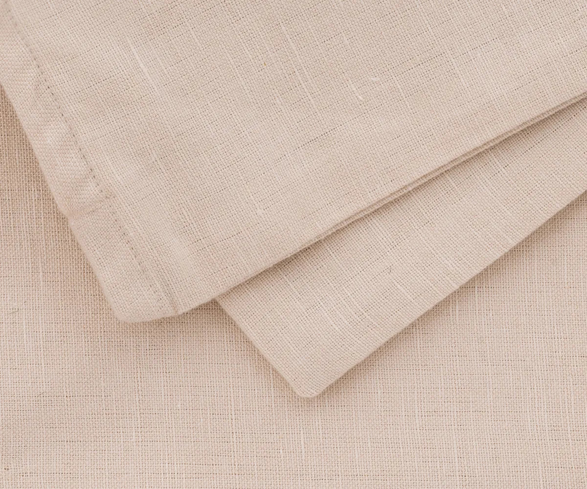 Natural linen cushion covers in multiple sizes, perfect for couch or patio