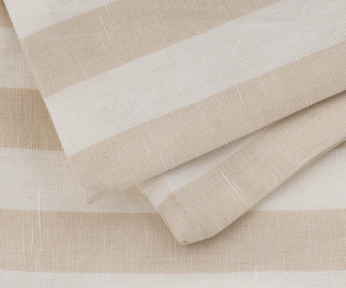 Zipper detail on soft beige striped cotton linen couch cushion cover