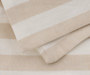 Zipper detail on soft beige striped cotton linen couch cushion cover
