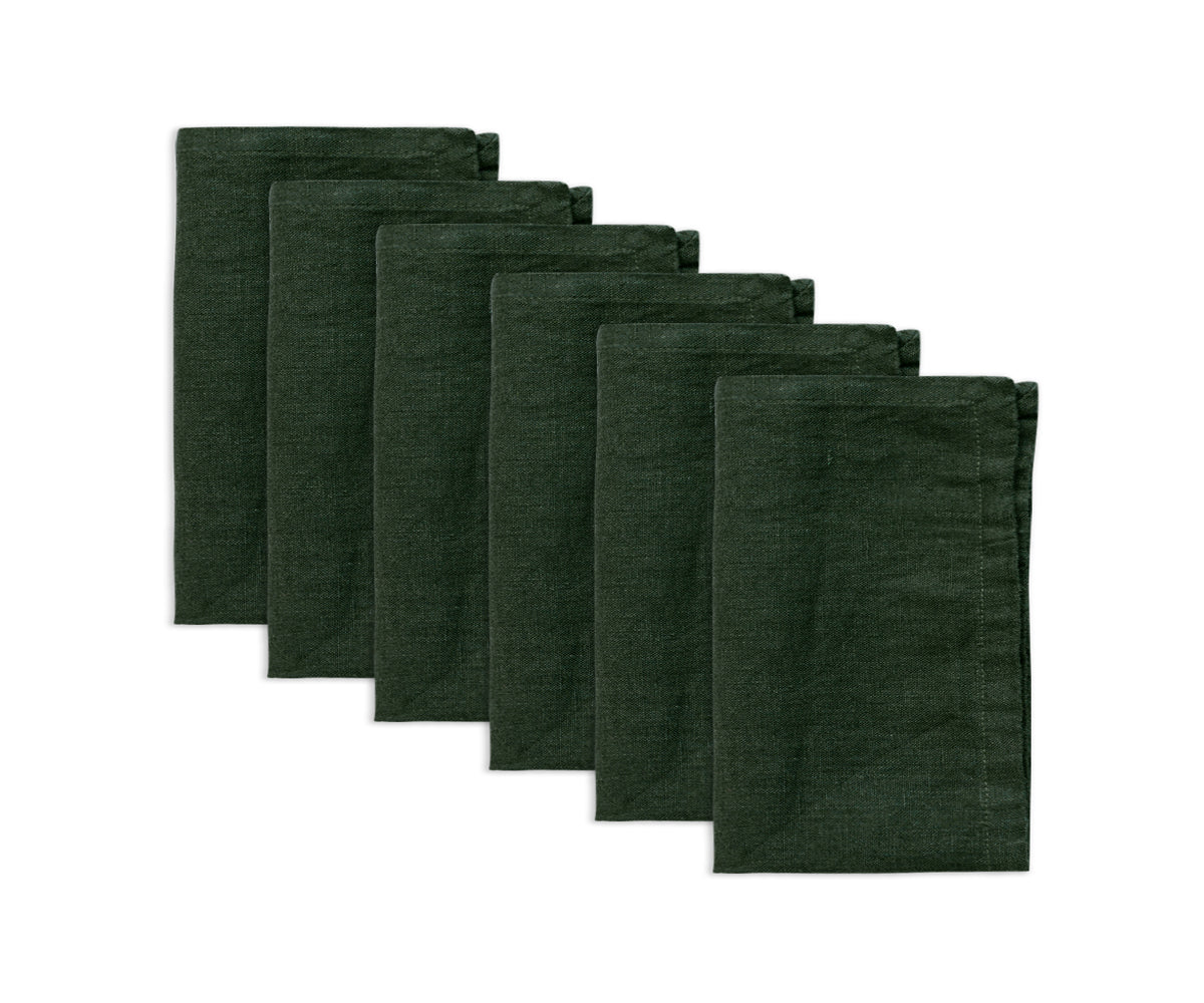 Folding napkins with precision, creating an artful and refined presentation for your table arrangement.