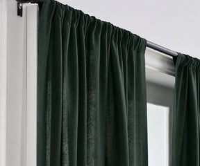 Dark green linen curtains hanging in a modern living room, adding an elegant and natural look. green linen curtains
linen curtains green
living room curtains green
bedroom curtains green
