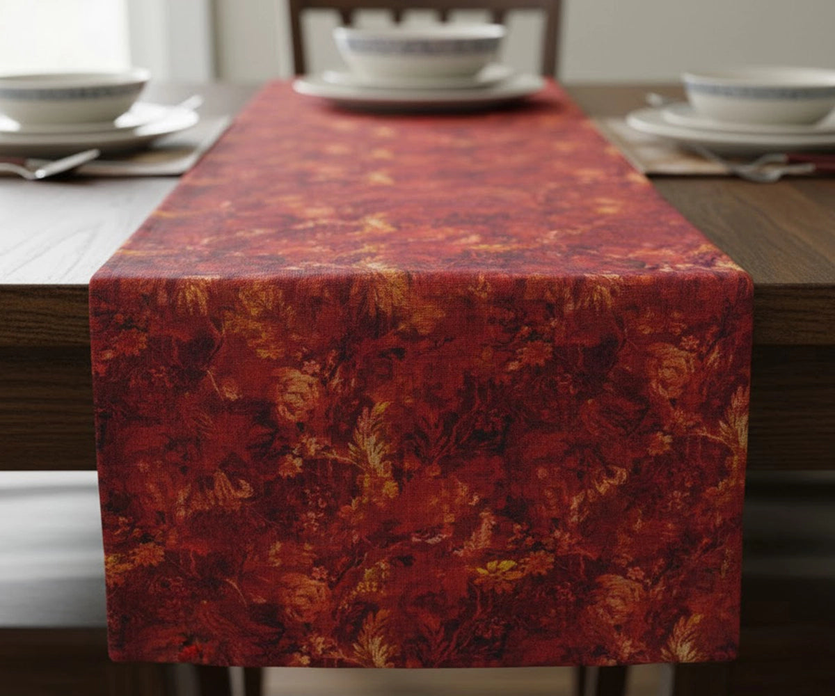 Red and orange abstract patterned tablecloth on a table