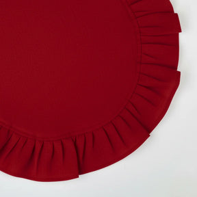 Dark red round ruffled cotton napkins with rich linen texture, ideal for festive dinners and elegant gatherings.