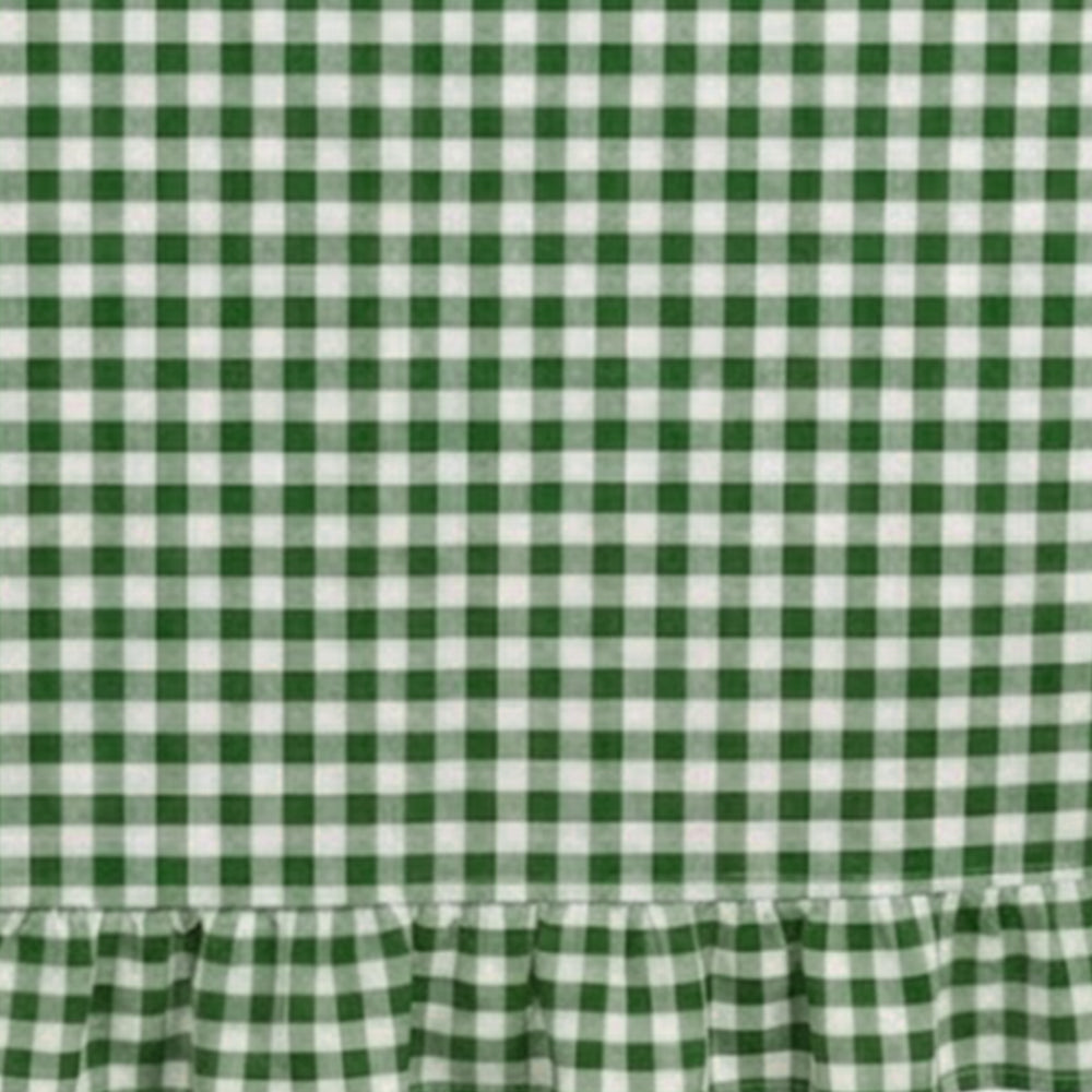 Close-up view of gingham cotton tablecloth material highlighting durable and smooth fabric quality