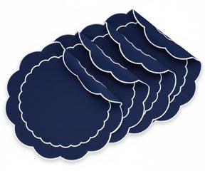 Round navy blue placemats with white trim for dining table