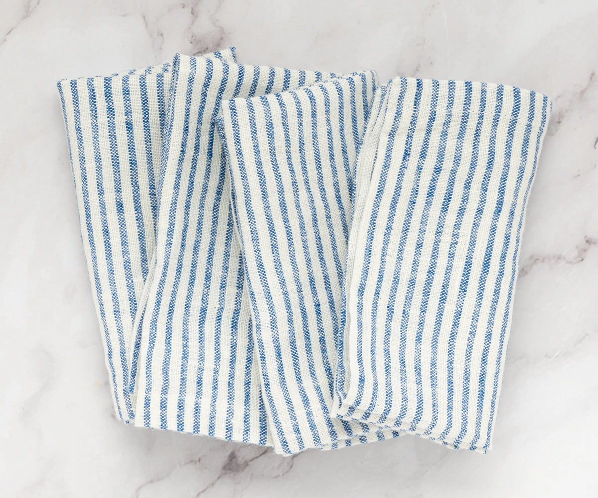 Washed napkins hanging to dry, emphasizing reusability and low-maintenance care